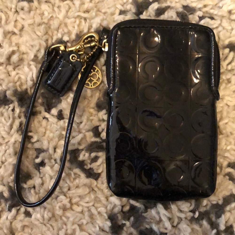 Coach black logo wristlet phone carrier